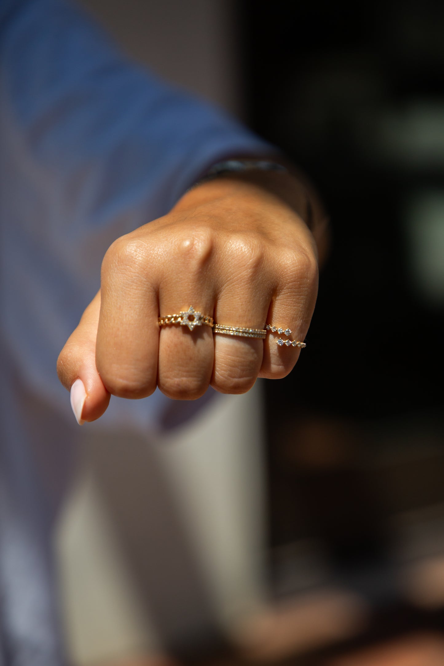 hand showcasing a gold ring