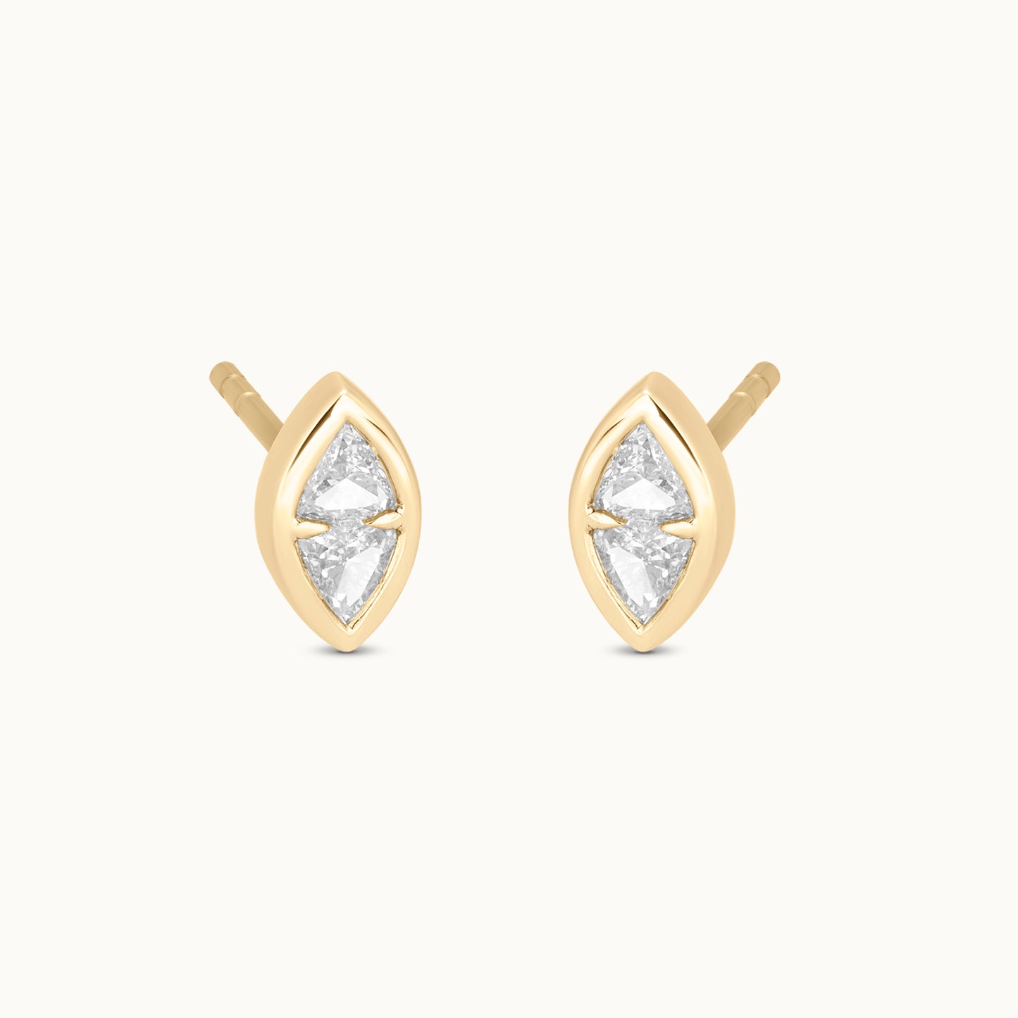 Gold earrings with clear gemstones