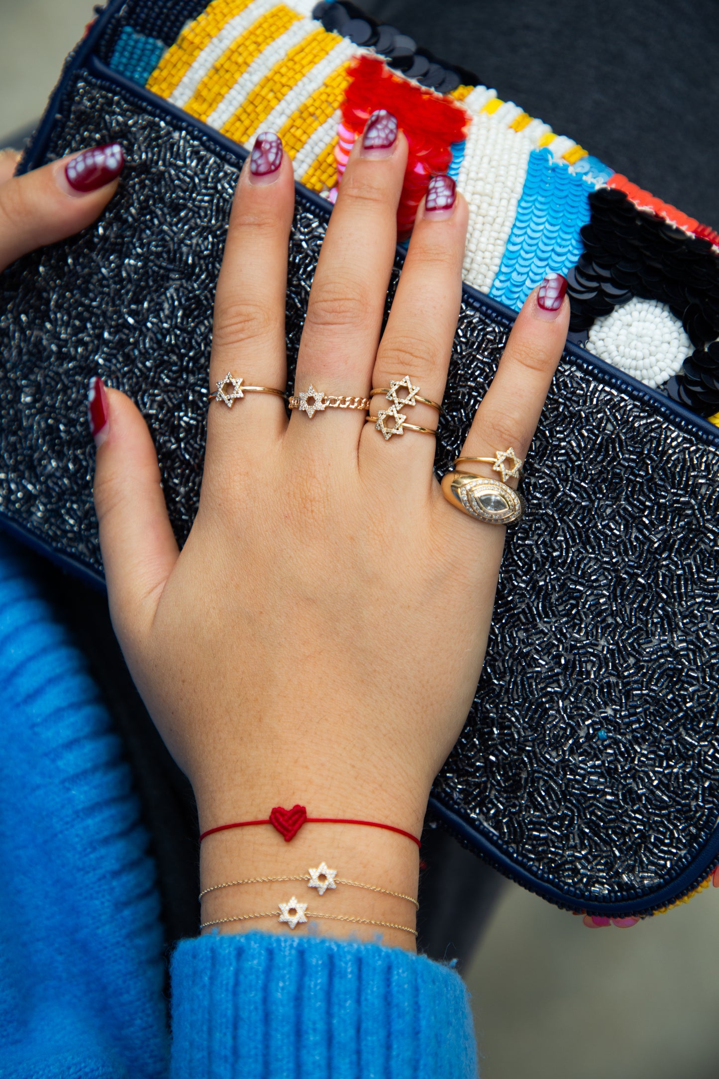 woman wearing multiple rings