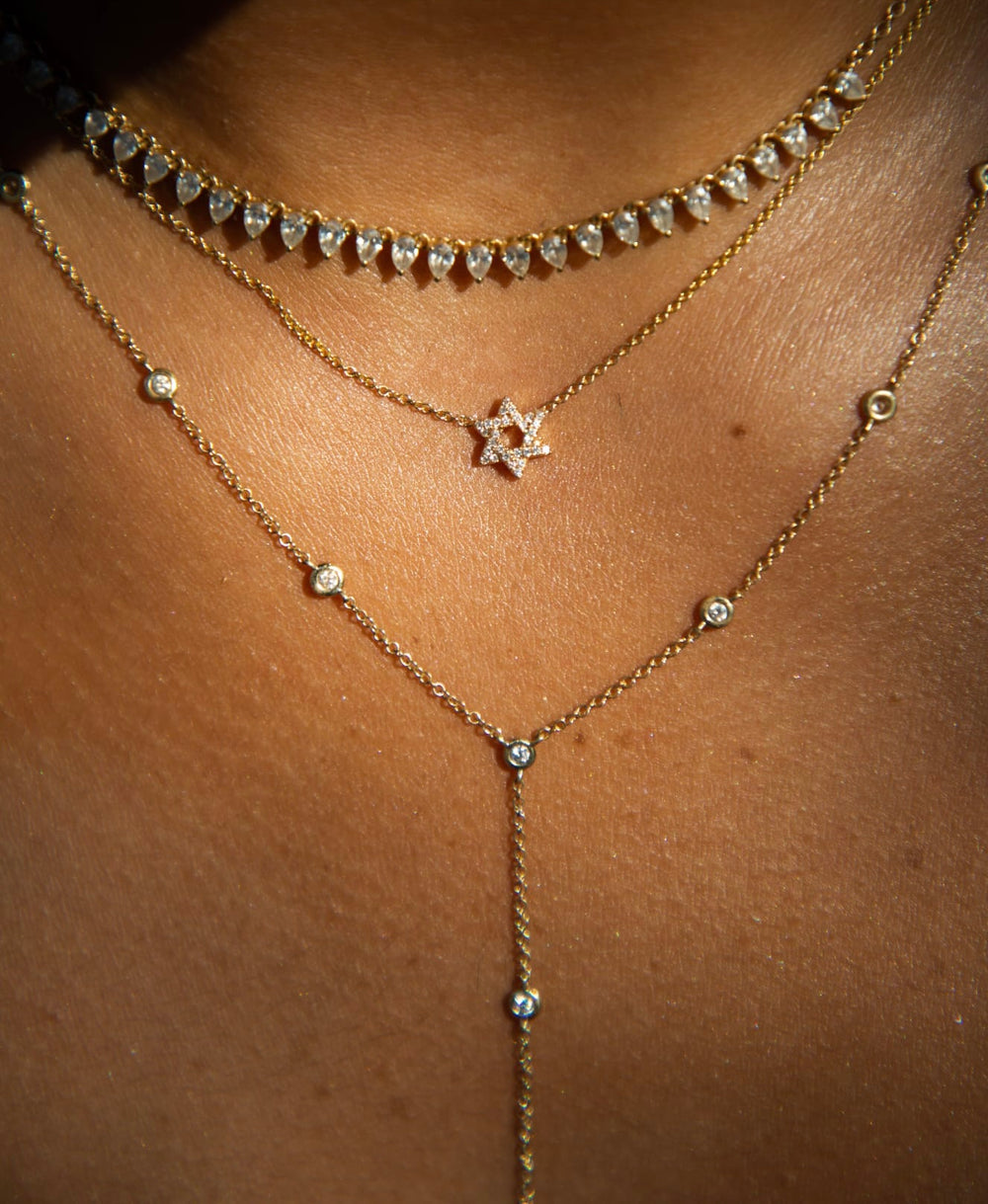 Star of David necklace with small diamonds encrusted on it