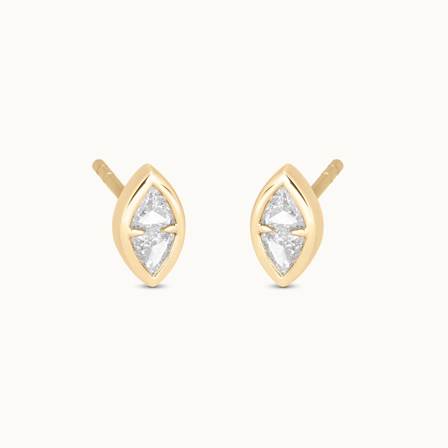 Gold earrings with clear gemstones 