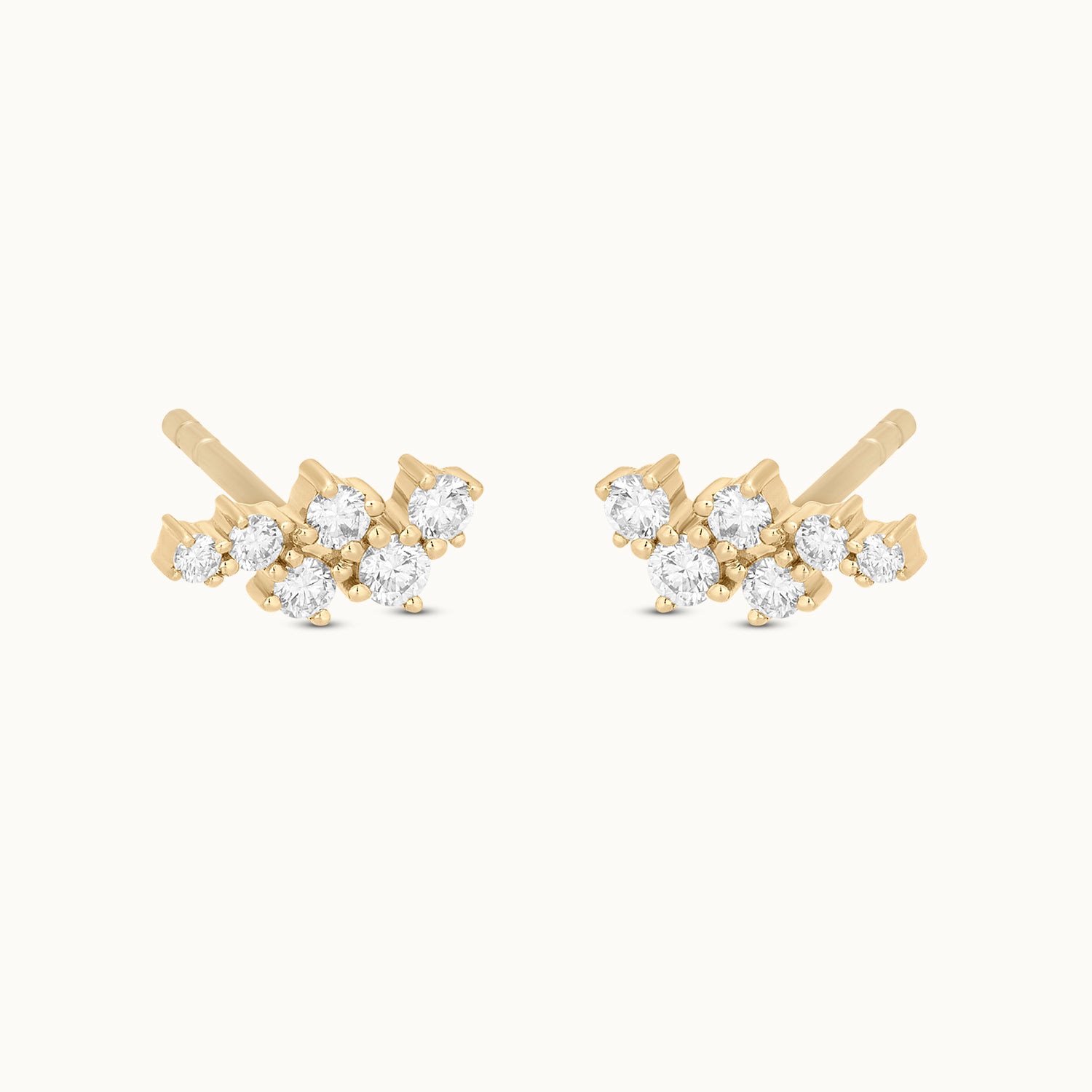 Gold earrings with clear gemstones