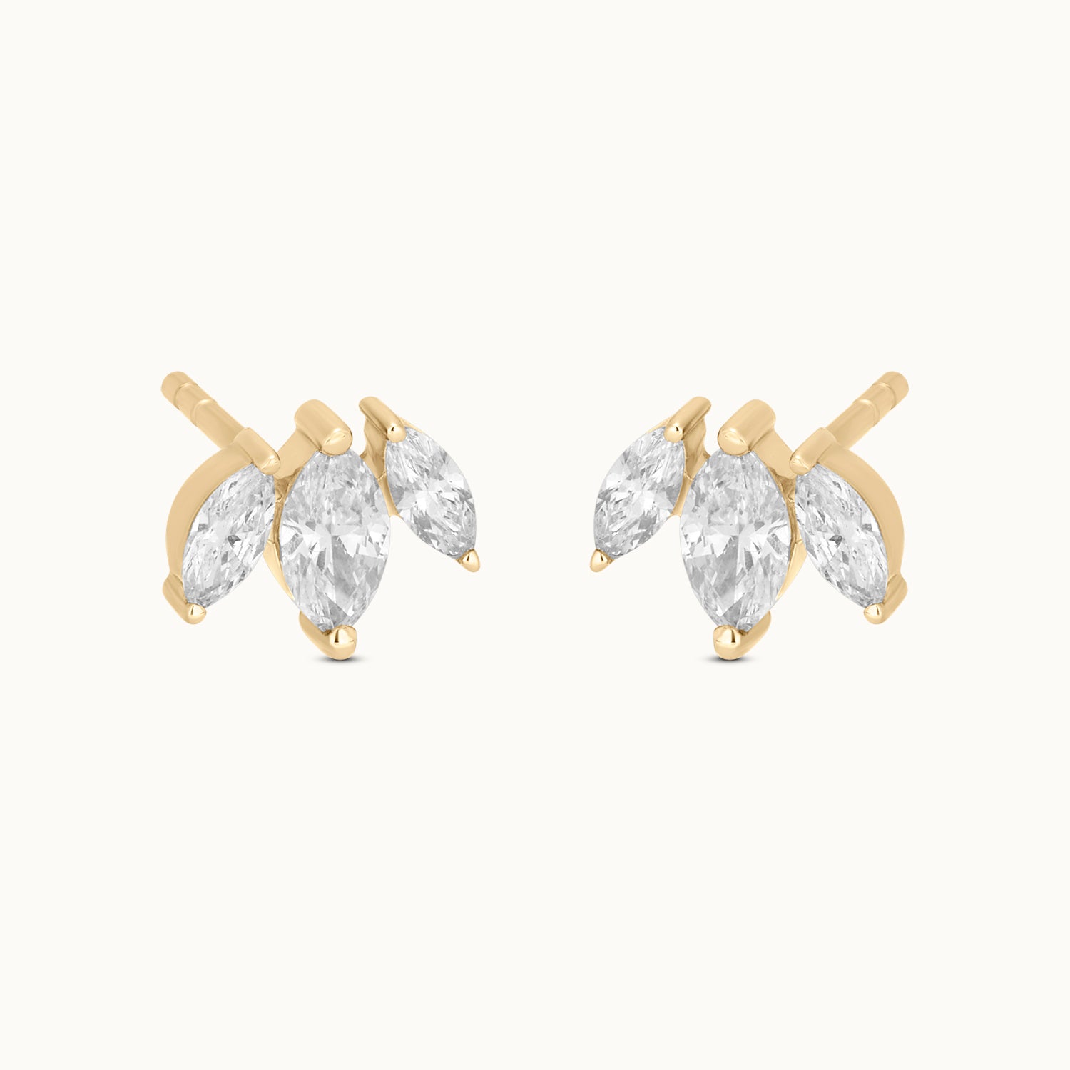 Gold earrings with clear gemstones