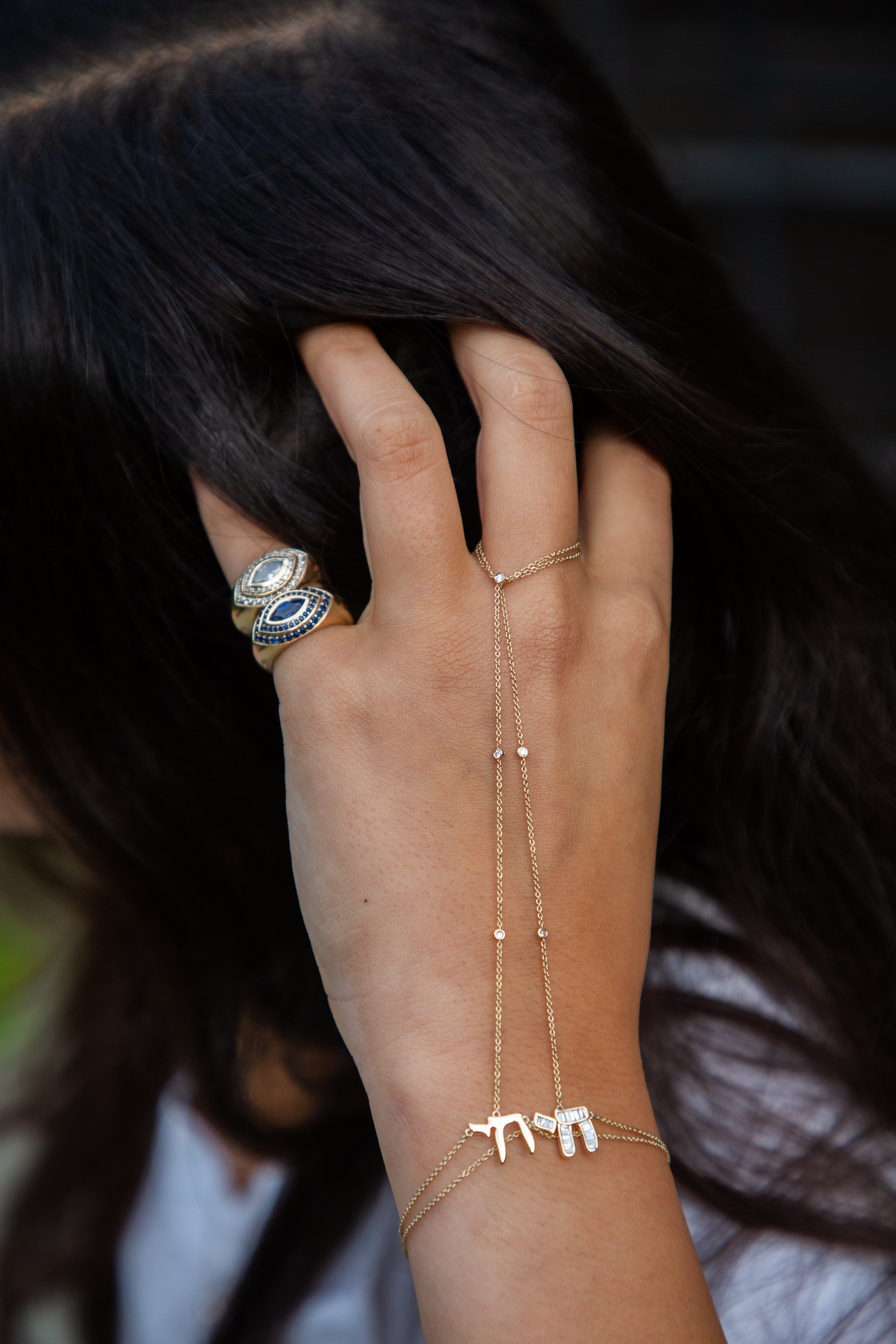 Gold Chai Hand Chain worn on hand