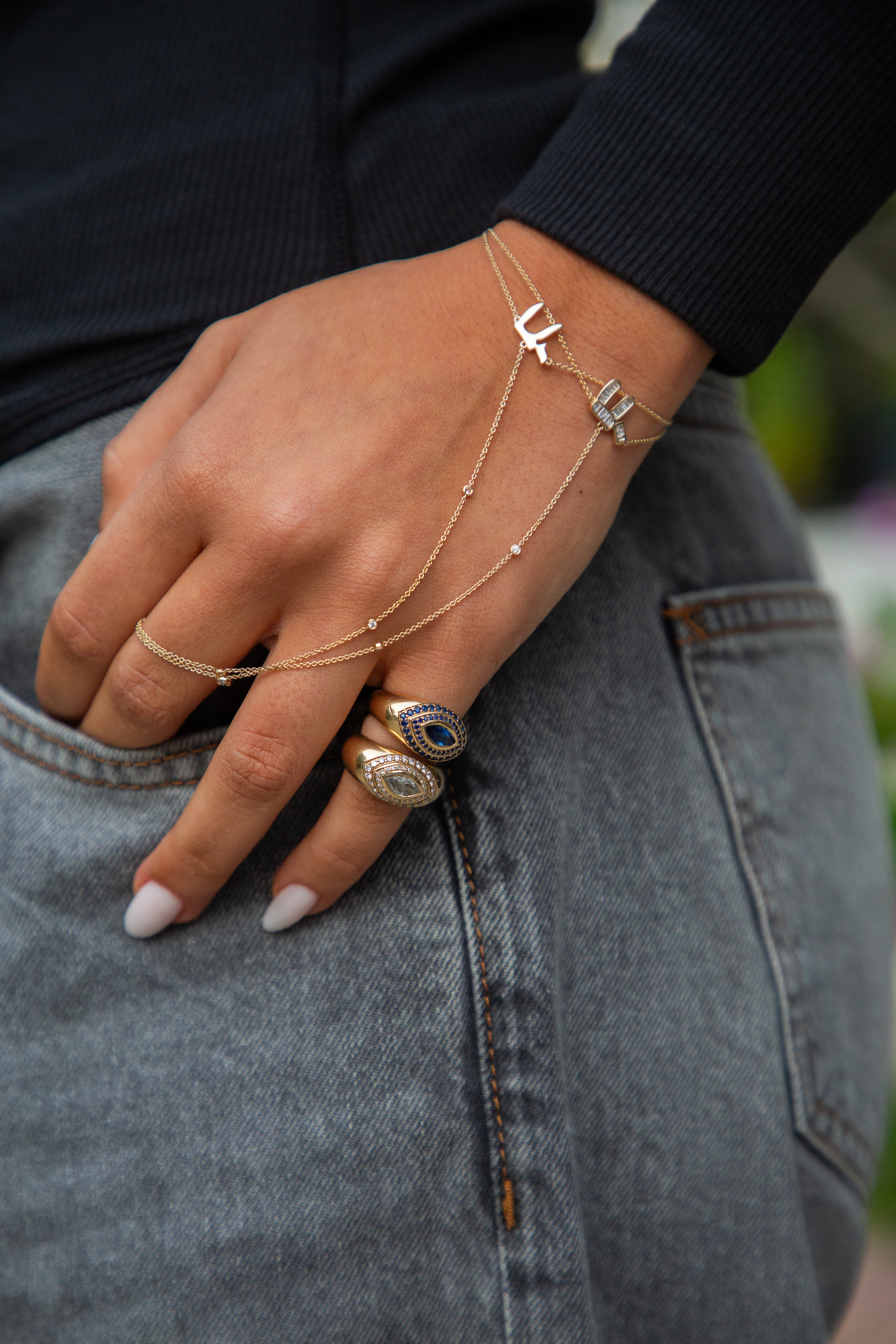 Diamond Chai Hand Chain worn on hand with rings 