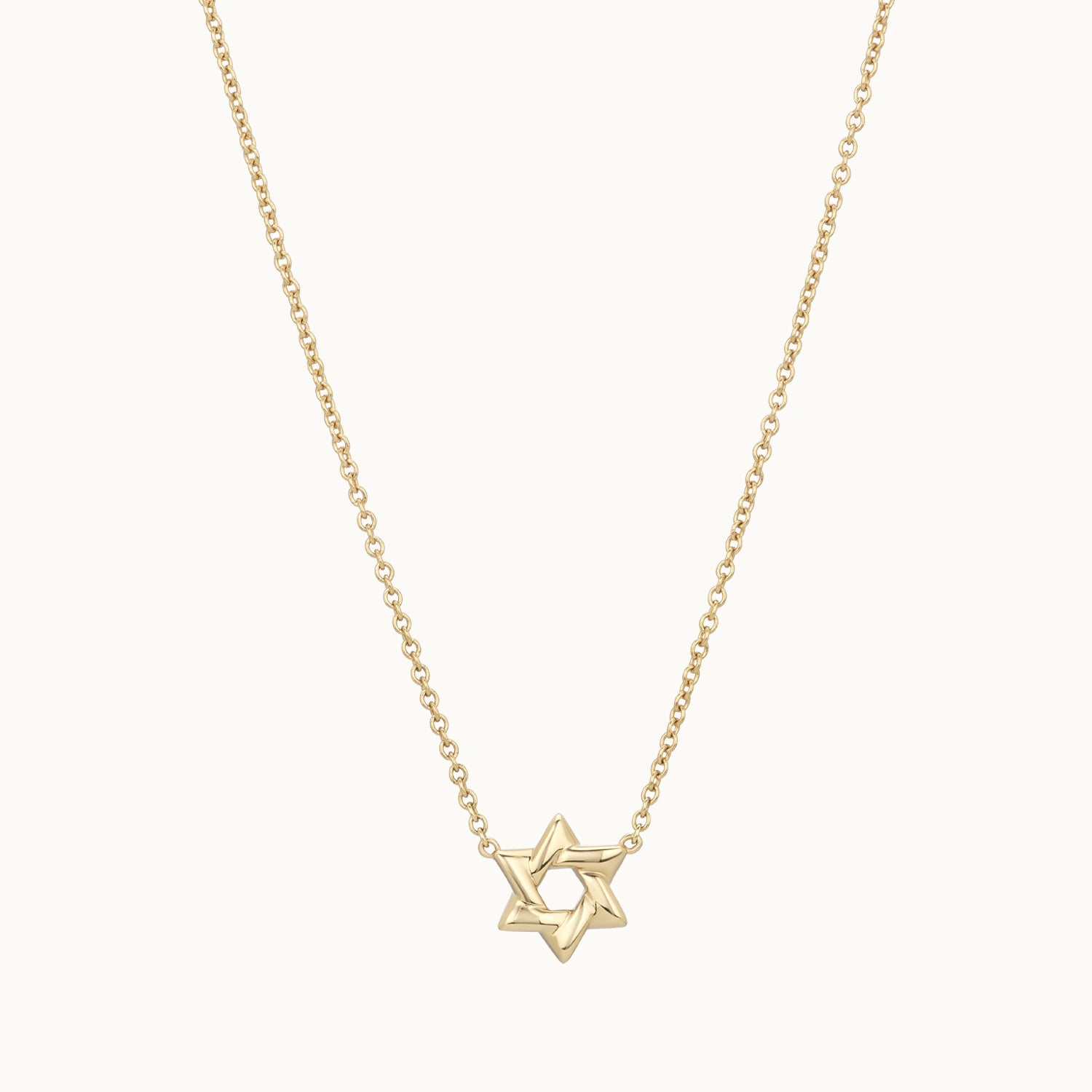 Gold necklace with a star pendant 
