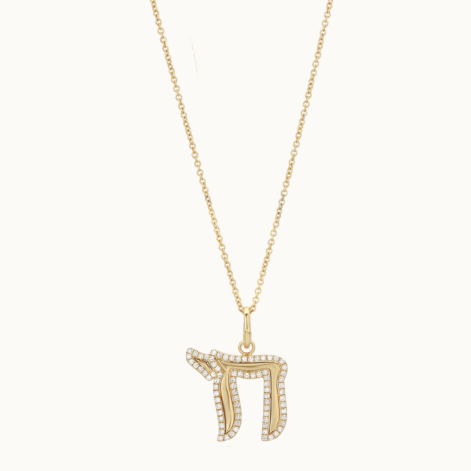 Gold necklace with a chai
