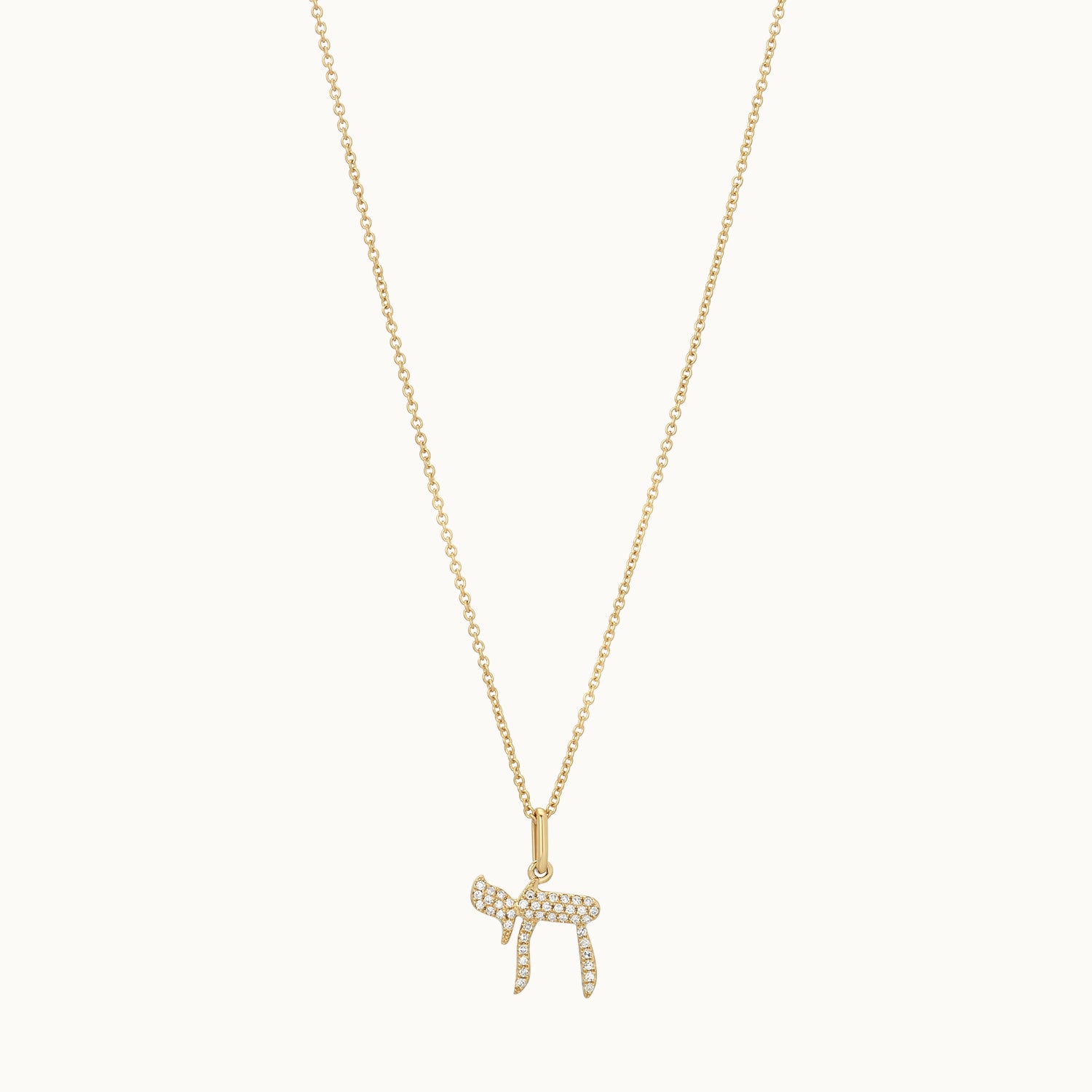 Gold necklace with a zodiac pendant