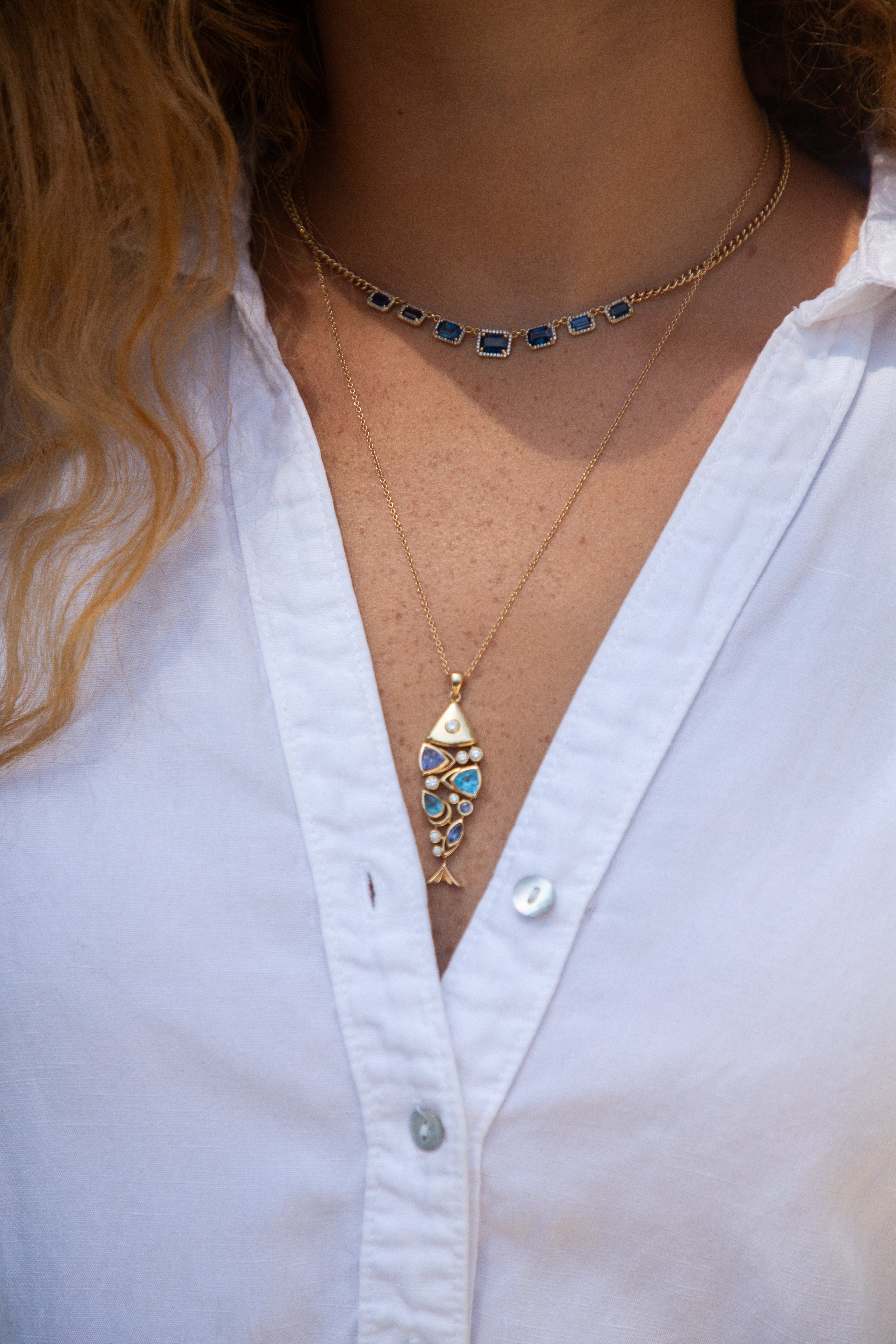 Close-up of a person wearing a white shirt