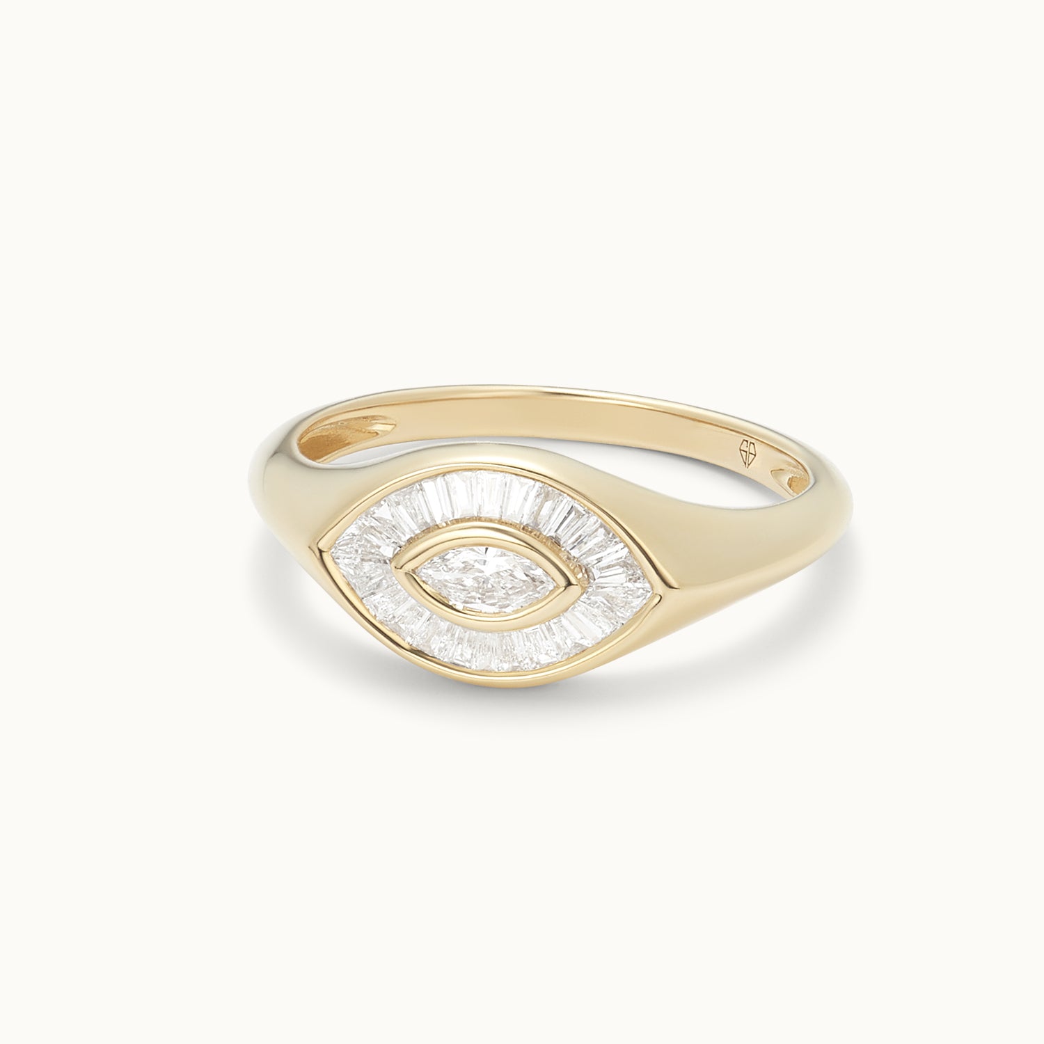 Gold ring with eye-shaped design